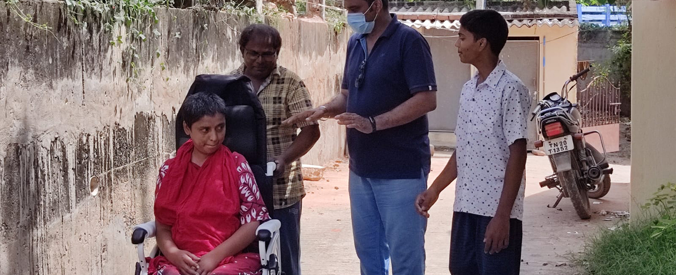 Trust volunteers visiting a family for wheelchair support