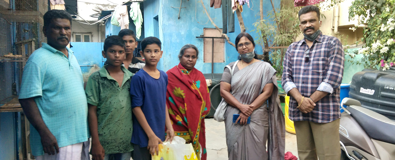 Trust volunteers visiting an underprivileged family