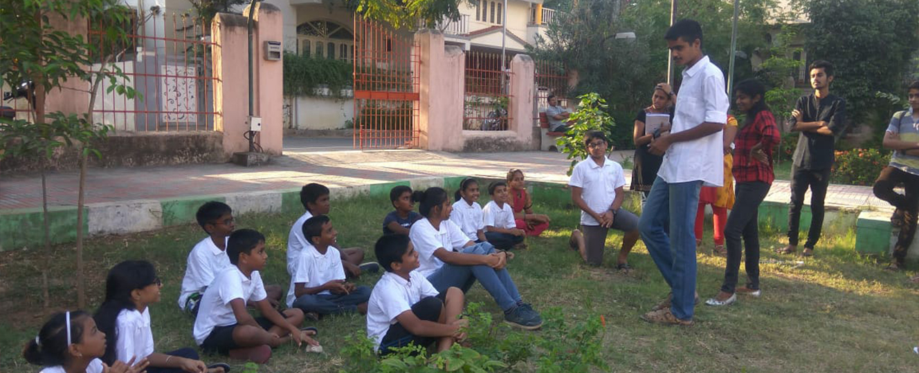 Thulirgal weekend session — group discussion outdoors